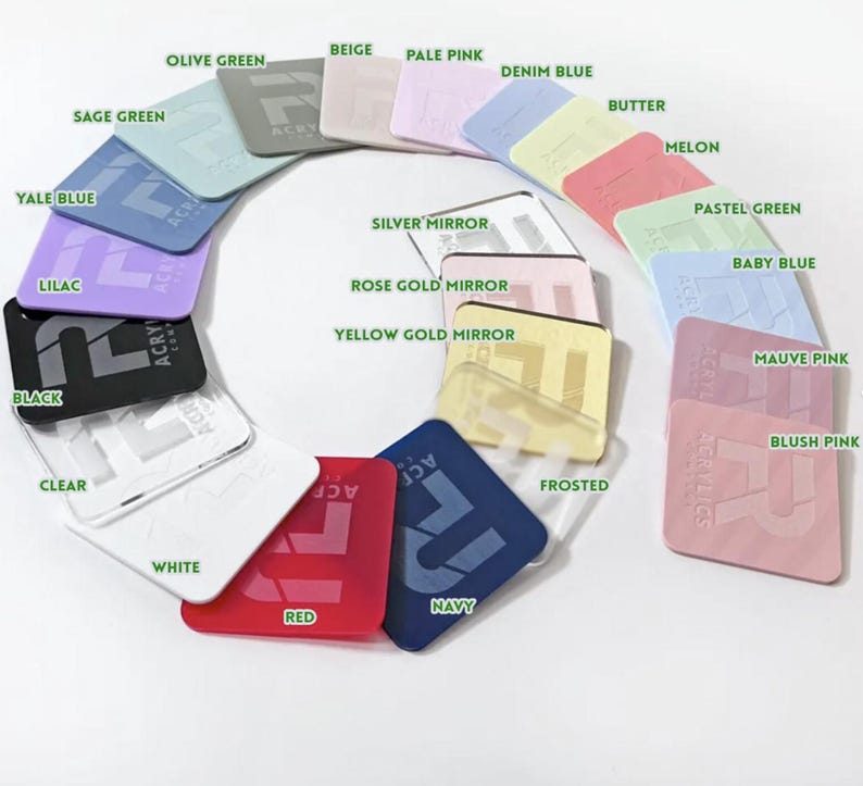 May include: A collection of square acrylic samples in various colors, including Olive Green, Beige, Pale Pink, Denim Blue, and Red. Each sample has the word "ACRYLICS" or "ACRY" printed on it. The samples are arranged in a circular pattern.