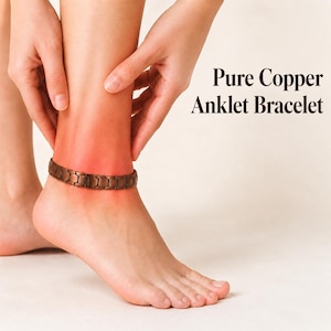 May include: A metallic copper-colored anklet bracelet featuring a series of rectangular, interlocking links. The text "Pure Copper Anklet Bracelet" is printed in dark brown lettering to the right of the jewelry piece on the plain background.