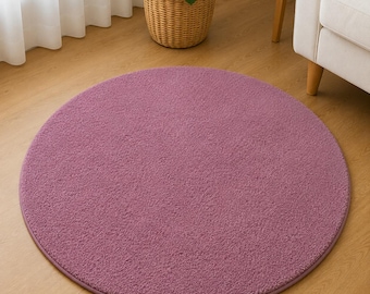 Alfombra redonda color malva, alfombra circular suave y mullida, alfombra de suelo minimalista y moderna.