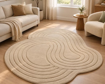 Alfombra de lana irregular tejida a mano, alfombra orgánica color crema, alfombra moderna de tonos neutros.