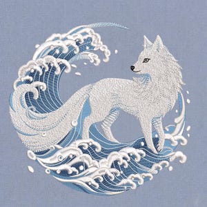 May include: An embroidery design on a light blue fabric featuring a white fox standing within a circular arrangement of stylized blue and white ocean waves. The fox is depicted in profile, facing left, with detailed stitching creating its fur texture.