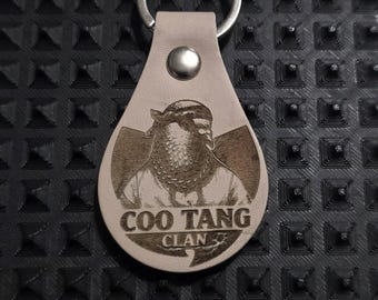 Llavero de paloma del clan Coo Tang inspirado en el clan Woo Tang.