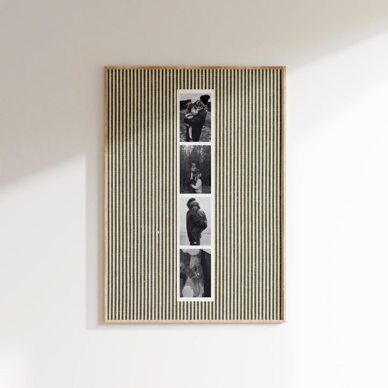 May include: A rectangular framed wall art piece with a vertical striped pattern in olive green and cream. Four black and white photographs are displayed vertically in the center. The frame has a natural wood finish.