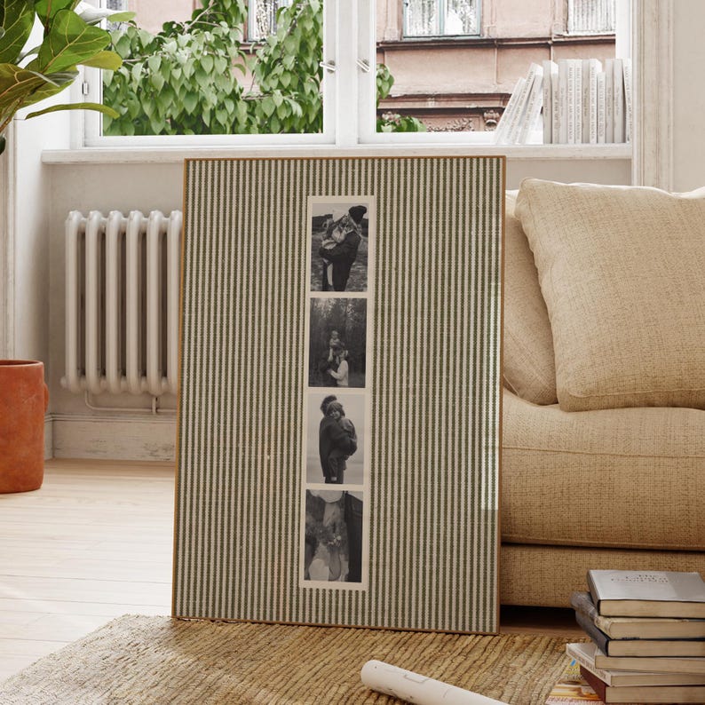 May include: A rectangular photo frame with a striped green and white pattern. The frame holds four black and white photographs. The frame is made of wood and is displayed in a well-lit room with a neutral color palette.