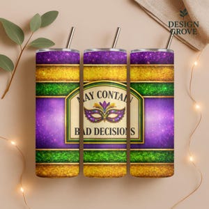 May include: Three stainless steel tumblers with straws, featuring a Mardi Gras-themed design. The design includes purple, gold, and green stripes, with the text "MAY CONTAIN BAD DECISIONS" and a mask graphic.