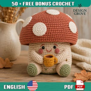 May include: A crochet mushroom figure with a rust-colored cap featuring white spots, a beige body, and green feet. The figure has a smiling face with pink cheeks and holds a small yellow mug. Text includes 50 + FREE BONUS CROCHET and DESIGN GROVE.