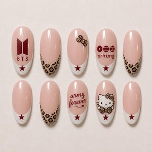 May include: Set of ten artificial nails with a light pink base, white tips, and various designs. Designs include a leopard print, a bow, the text "BTS", "arirang", "army forever", and a Hello Kitty character.