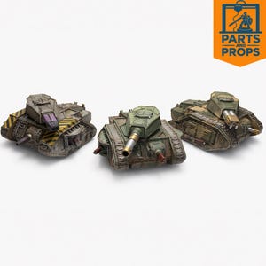 May include: Three miniature model tanks in shades of green, brown, and grey, with detailed features like turrets, treads, and cannons. One tank has yellow and black diagonal stripes. The tanks are set against a white background.