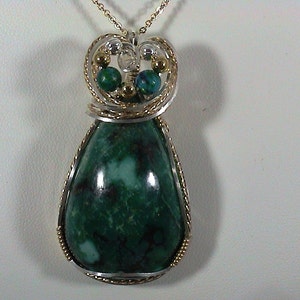 Persian turquoise pendant in gold and silver