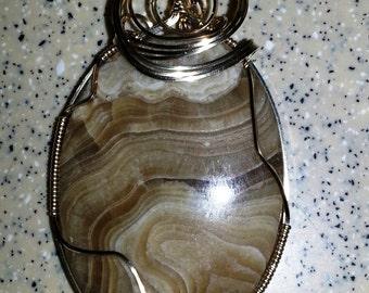 Rootbeer Onyx pendant wire wrapped in 14kt gold fill wire