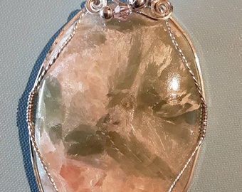 Russian Sunstone pendant wrapped in sterling silver wire