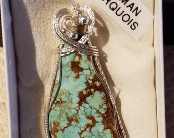 Kingman Turquoise pendant wrapped in sterling silver wire