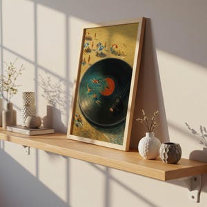 May include: A framed art print depicting a beach scene within a vinyl record design. The artwork features a black record with a red label, a beach with people, and a wooden frame. The print is displayed on a wooden shelf with decorative vases.