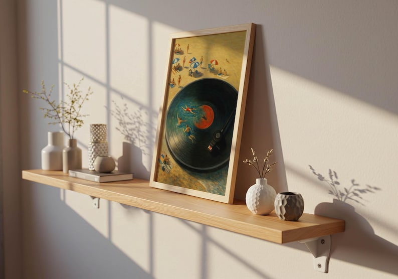 May include: A framed art print depicting a beach scene within a vinyl record design. The artwork features a black record with a red label, a beach with people, and a wooden frame. The print is displayed on a wooden shelf with decorative vases.