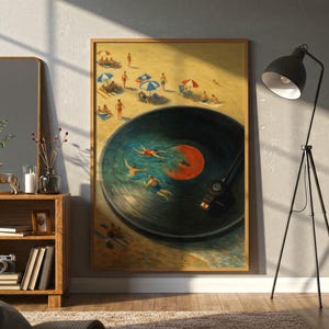 May include: A framed art print depicts a beach scene with people swimming in a vinyl record. The artwork features a sandy beach with umbrellas and swimmers in the water, with a record player needle in the image.