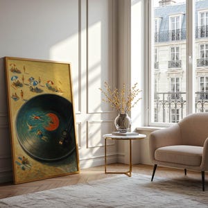 May include: A framed artwork depicting a beach scene within a vinyl record design. The artwork features figures on a sandy beach and swimmers in the water, with a warm color palette. The frame is a light wood color, and the artwork is leaning against a white wall.