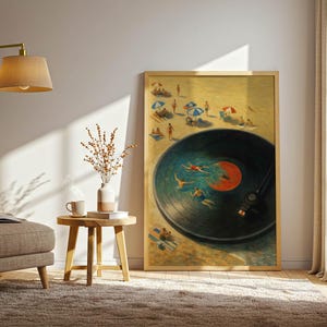 May include: A framed art print depicts a vinyl record with people swimming in the grooves, set against a beach scene. The artwork is in a room with a beige armchair, a gold lamp, and a small wooden side table. The room has a neutral color palette.