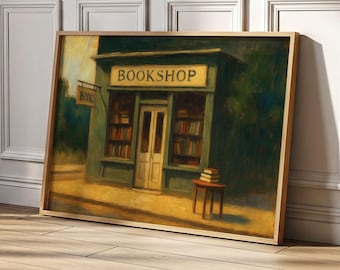 Könnte beinhalten: Gerahmtes Gemälde eines malerischen Buchladens. Der Laden ist in Grün- und Gelbtönen gehalten, mit dem Wort "BOOKSHOP" über dem Eingang. Ein kleines Schild zeigt "BOOKS". Ein kleiner Tisch mit Büchern steht davor.