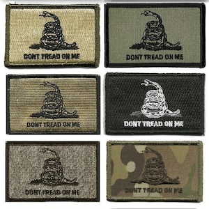 May include: Rectangular patches featuring the Gadsden flag design, with a coiled rattlesnake and the text "DON'T TREAD ON ME." Patches come in various colors, including yellow, green, camouflage, and black, with the snake and text in contrasting colors.