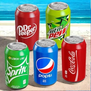 May include: An assortment of soda cans, including Dr. Pepper, Mountain Dew, Sprite, Pepsi, and Coca-Cola, are displayed on a sandy surface. The cans are in various colors, with the logos and branding clearly visible.