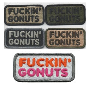 May include: A collection of embroidered patches with the phrase "FUCKIN' GONUTS" in various color combinations. The patches are rectangular with a stitched border, featuring orange, pink, and green lettering.