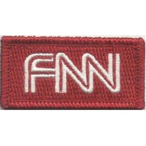 May include: A rectangular embroidered patch with a deep red background and a thick, stitched border. The letters FNN are displayed in the center in a bold, white, sans-serif font with a clean, modern, and uniform stitch pattern throughout.