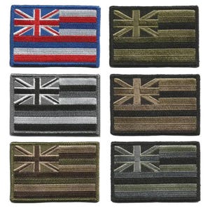 May include: A collection of six rectangular embroidered patches featuring the flag of Hawaii. The patches display the flag in various color schemes, including blue, red, white, black, gray, and shades of green and brown. The Union Jack is in the upper left corner.