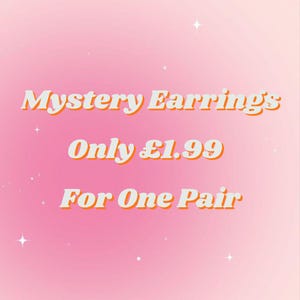 May include: A pink gradient background with the text "Mystery Earrings" in white with an orange outline. Below, the text "Only £1.99 For One Pair" is displayed in the same style. Small white stars are scattered across the background.