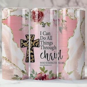 May include: A stainless steel tumbler with a pink and white marble design, gold accents, and floral illustrations. The tumbler features a leopard print cross and the text "I Can Do All Things Through Christ".