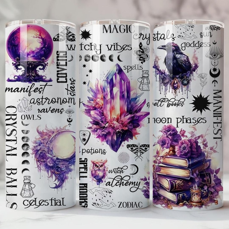 May include: Three white tumblers with mystical designs. One features a crystal ball, another a large purple crystal, and the third a raven and stacked books. Text includes "Crystal Balls", "Magic", "Witchy Vibes", and "Manifest".