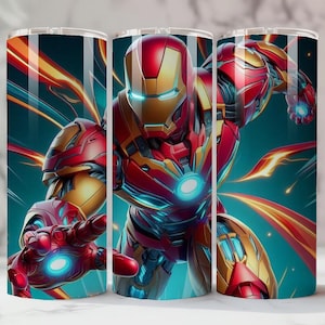 May include: Three stainless steel tumblers with an Iron Man illustration. The design features Iron Man in red and gold armour, with blue energy effects on a teal background. The tumblers are cylindrical and are approximately 20 cm tall.