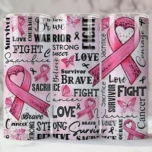 May include: Three pink and white tumblers with a breast cancer awareness theme. Each tumbler features a pink ribbon with a heart design, butterflies, and words like "Survivor", "Brave", and "Fight".