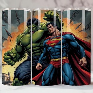 May include: Three stainless steel tumblers with a comic book design of the Hulk and Superman. The Hulk is green, and Superman is in a blue suit with a red cape. The background depicts a battle scene with explosions and flying objects.