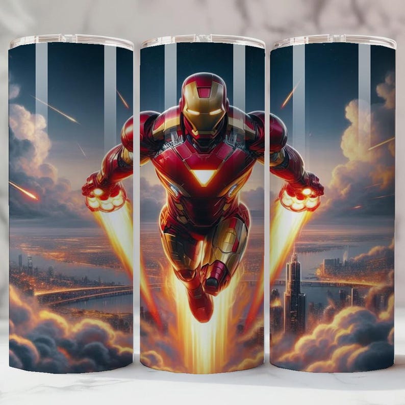 May include: A stainless steel travel mug with a dynamic image of Iron Man soaring through the sky. The design features the superhero in his red and gold suit, with a cityscape and fiery effects. The mug is suitable for both hot and cold drinks.
