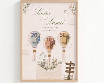 May include: A framed print featuring the names Laura and Daniel, the date 18 August 2026, and three hot air balloon illustrations made from 20, 10, and 50 Euro banknotes. Below are botanical illustrations, an envelope, and a wooden signpost.