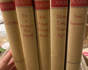 May include: A set of five vintage paperback books by Ogden Nash, all published by Little, Brown and Company. The titles are "Versus", "I'm a Stranger Here Myself", "The Private Dining Room", "Many Long Years Ago", and "Good Intentions".
