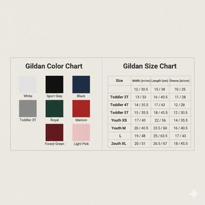 Puede incluir: Un gr&aacute;fico que muestra las opciones de color Gildan, incluyendo blanco, negro y granate. Una tabla de tallas muestra medidas en pulgadas y cent&iacute;metros para varias tallas, desde ni&ntilde;os peque&ntilde;os hasta adultos.