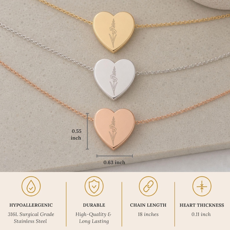 May include: Three heart-shaped pendants on delicate chains in gold, silver, and rose gold tones. Each heart features a fine-line floral engraving. The heart measures 0.55 inches by 0.63 inches, with a thickness of 0.11 inches and an 18-inch chain.