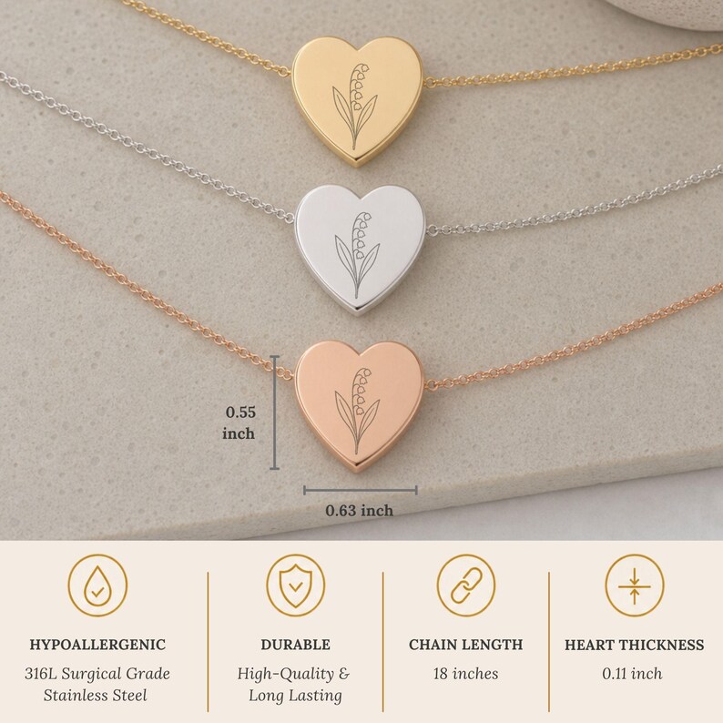Pu&ograve; includere: Tre ciondoli a forma di cuore su catenine delicate in tonalit&agrave; oro, argento e oro rosa. Ogni cuore presenta un'incisione di mughetto. Il cuore misura 1,4 cm per 1,6 cm, con una catena di 45,7 cm e uno spessore di 0,28 cm.
