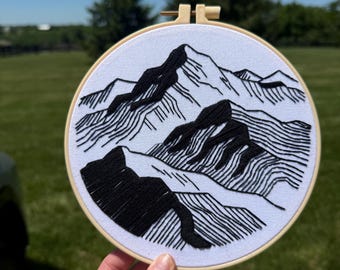 Bordado de paisaje hecho a mano