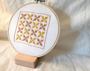 Diseño de colcha pequeña bordada a mano