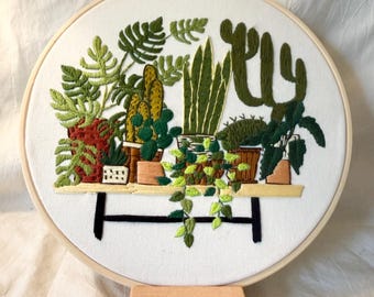 Bordados hechos a mano con plantas de interior