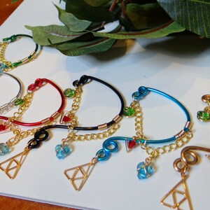 L.O.Z.® Wise Ear Bend with Hanging Spiritual Stones and Triforce in Red image 5