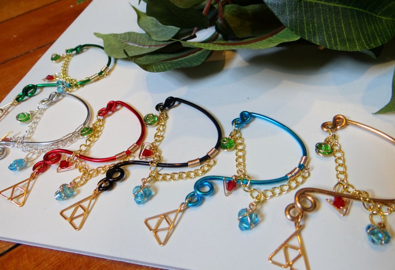 L.O.Z.® Wise Ear Bend with Hanging Spiritual Stones and Triforce in Red image 5