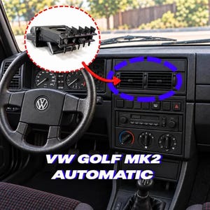 Könnte beinhalten: Eine schwarze Armaturenbrett-Lüftungsdüse aus Kunststoff für den VW Golf MK2 mit horizontalen Lamellen und einem rechteckigen Rahmen. Das Bauteil ist als Einzelteil in einem kreisförmigen Ausschnitt und eingebaut im Armaturenbrett zu sehen.