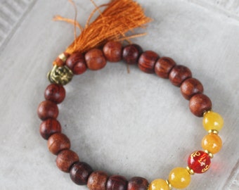 Mala Bracelet - Yellow Jade and Rosewood, Rust Tassel bracelet, Etched Quartz Om Bead - Stretch bracelet, 6 1/2", stacking bracelet, yoga