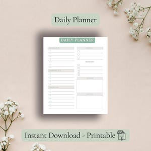 May include: A white daily planner with a green header that reads "Daily Planner." The planner includes sections for a morning, afternoon, and evening plan, priorities, a to-do list, intention, and gratitude. The text "Instant Download - Printable" is at the bottom.