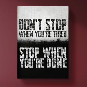 The image is a motivational poster with the text "DON'T STOP WHEN YOU'RE TIRED" and "STOP WHEN YOU'RE DONE" displayed prominently.