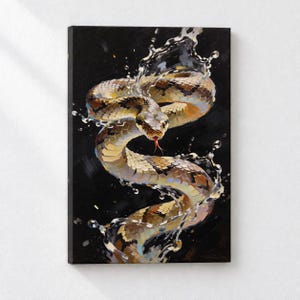 May include: A rectangular canvas print featuring a coiled snake with brown and tan scales against a solid black background. The snake is surrounded by dynamic, splashing water droplets and ripples, with its red tongue extended forward.
