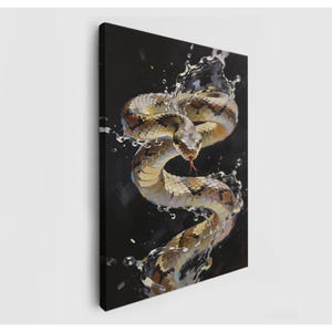 May include: A canvas print featuring a detailed painting of a snake emerging from water. The snake has a tan and brown pattern with a red tongue. Water splashes around the snake against a dark background.